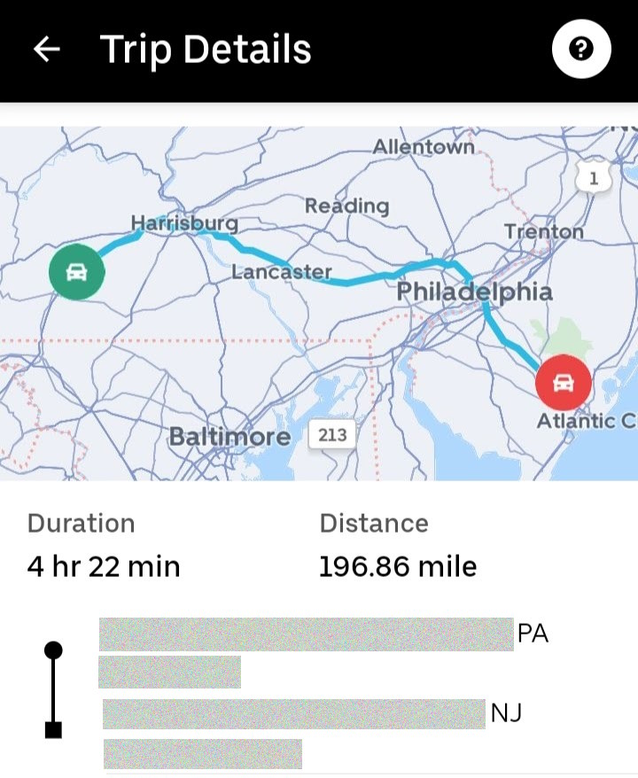 An Uber Driver app trip log, with the heading Trip Details at the top of the screen. Below the heading, a map is shown. The map appears to show a line being drawn from a green start point in Southern Pennsylvania to a red end point in Southern New Jersey. The trip log states that the duration of the trip was four hours twenty two minutes, and the distance of the trip was 196.86 miles. The bottom of the screen shows a heavily censored pick up and drop off address section, with the acronyms PA and NJ being the only details visible.